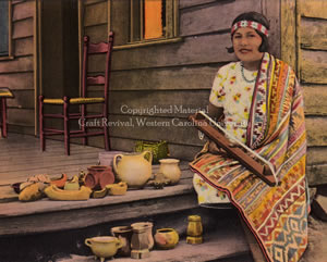 Cora Wahnetah with bead loom and display of pottery