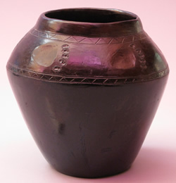 Blackware vase with bear paw imprint by Mabel Bigmeat Swimmer