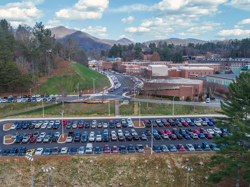 An aerial shot of the band practice field parking lot.