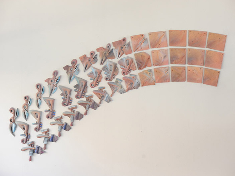 Kathy Triplett, American  The Tools We Use, 1996  Ceramic tiles, 48 x 160 inches  Location: Belk Building Atrium