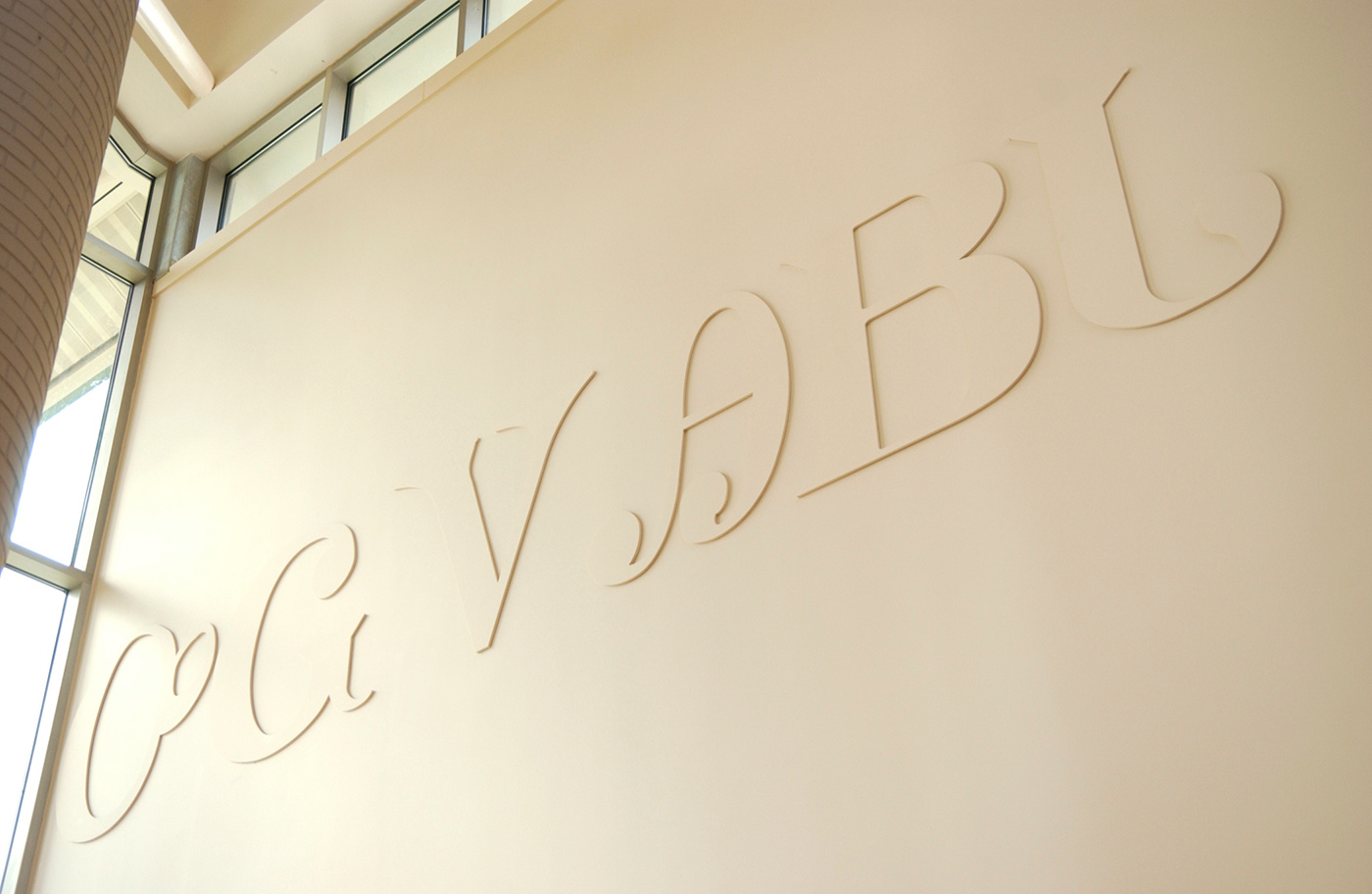 Cherokee Syllabary on the wall at Bardo Arts Center