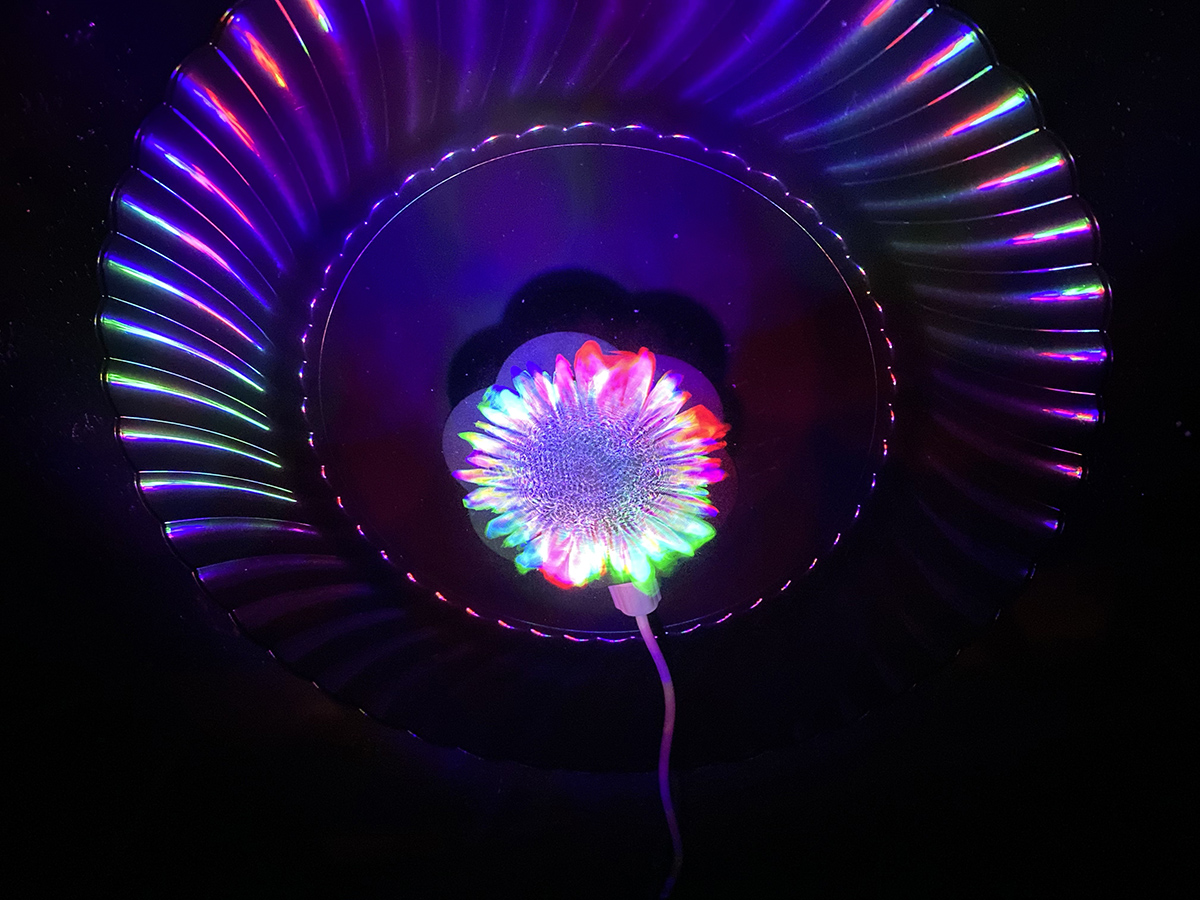 Resonator in water making multi-colored lights