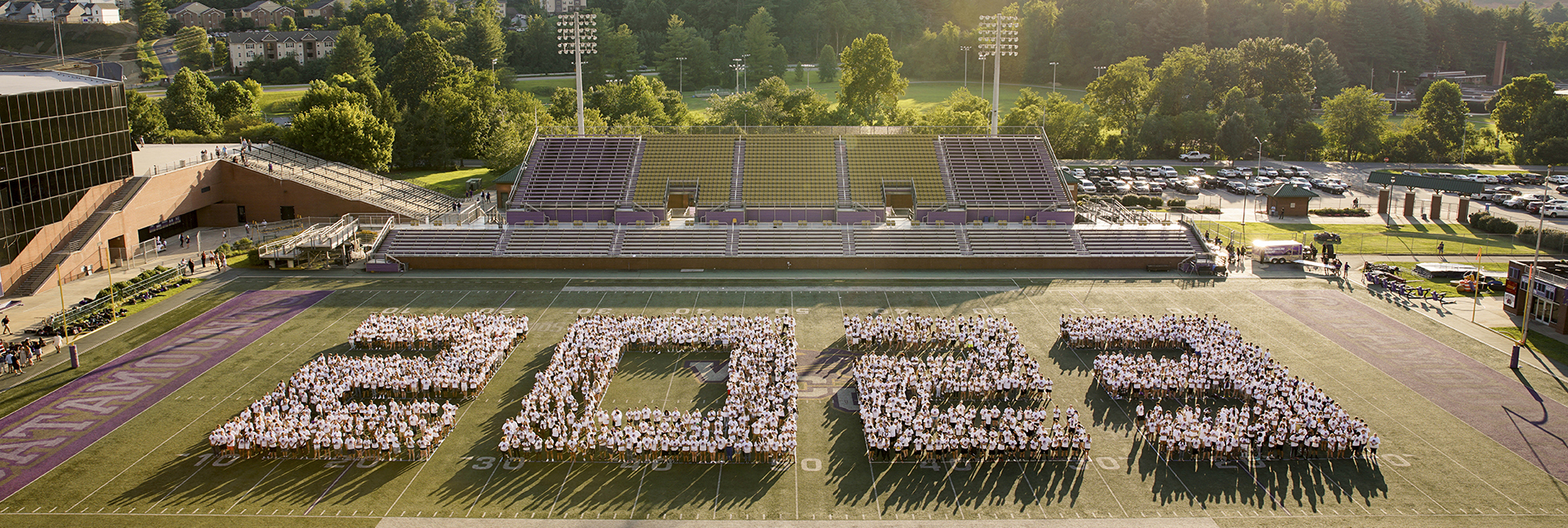 aerial photograph of the class of 2023 on the football field