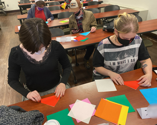 students making Christmas origami