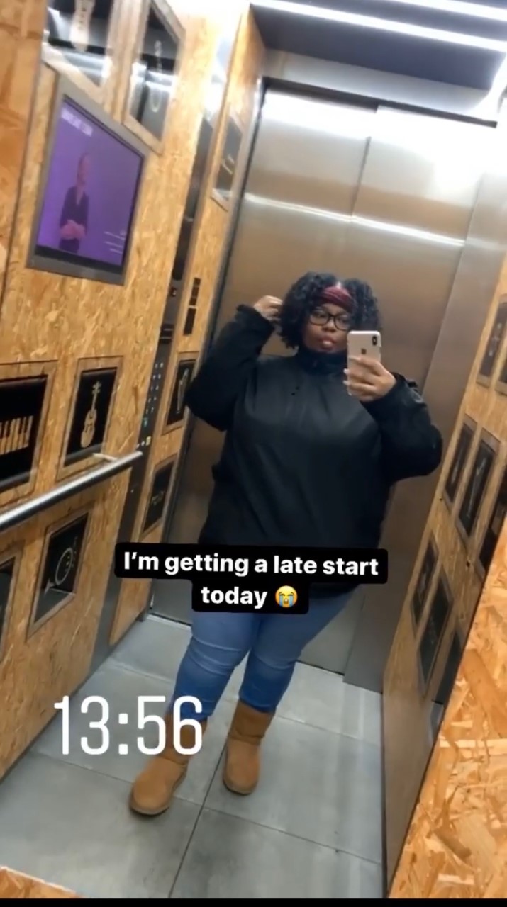 MSears taking a mirror selfie in elevator