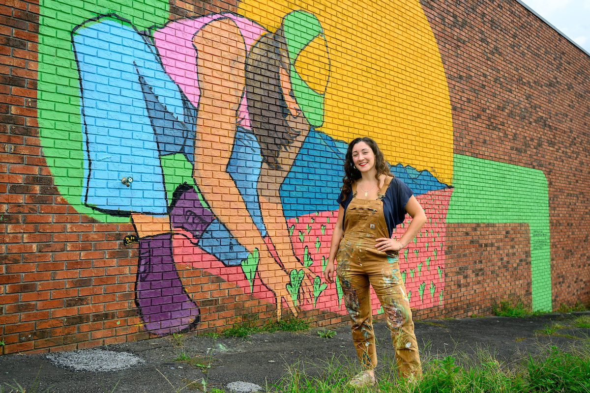 mia with mural