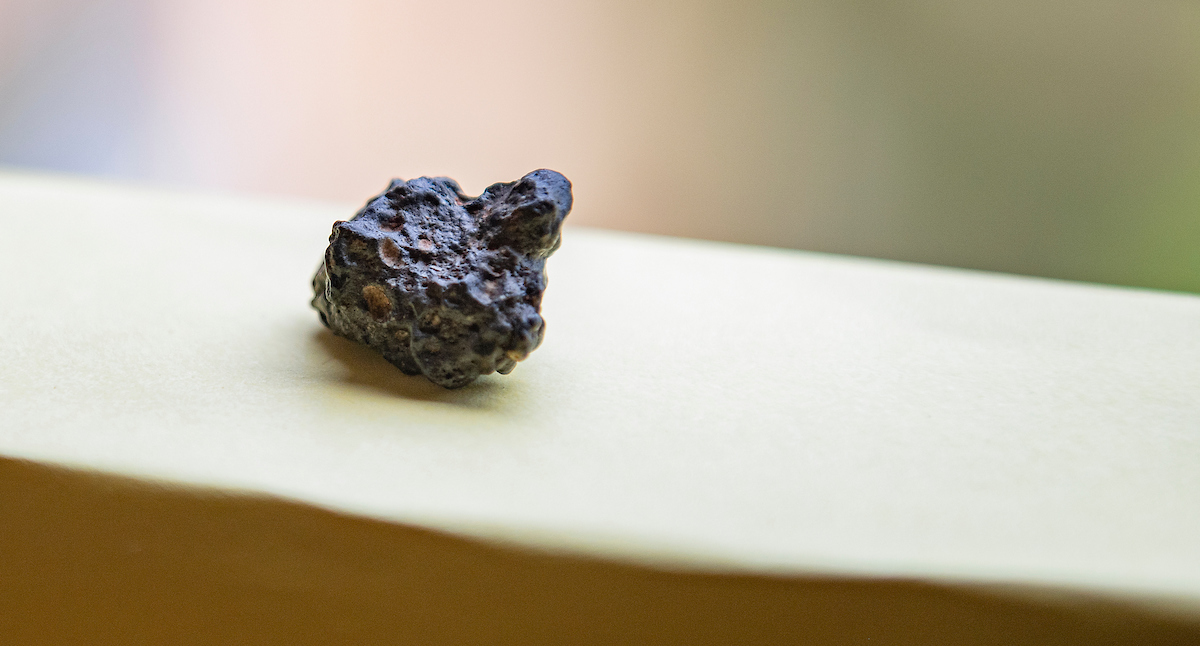A close up of a piece of a space rock