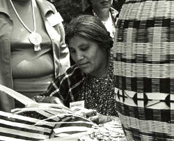 Nancy Conseen with basket in foreground