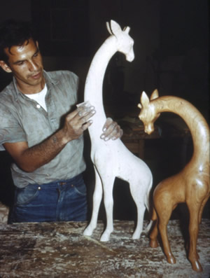 Virgil Ledford sanding his carving