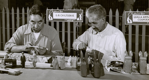 Goingback and Watty Chiltoskie demonstrating at the Craftsman’s Fair of the Southern Highlands. Goingback (left) is shown carving a number of figures, while Watty (right) is making bookends. Before Goingback married, both brothers spelled their name “Chiltoskie”. Southern Highland Craft Guild.