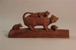 Possum family woodcarving