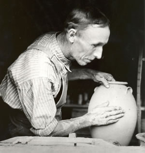 Reems Creek potter working pot